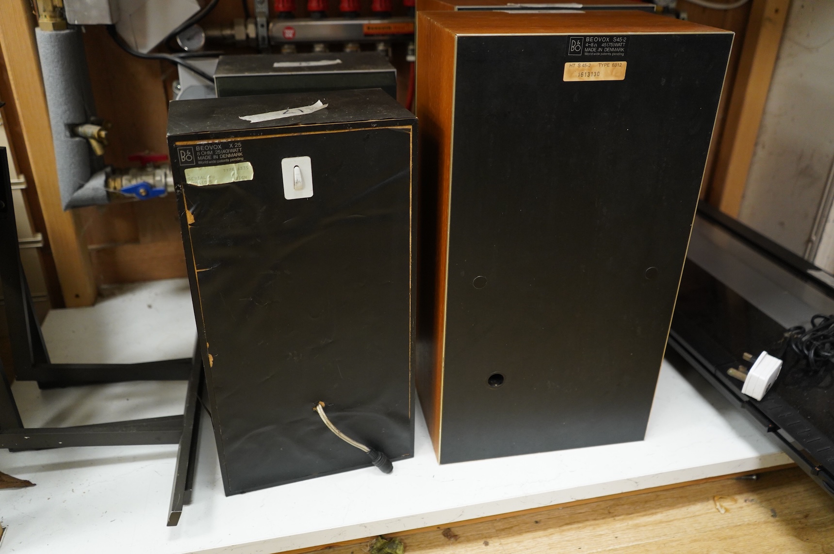 A collection of Bang & Olufsen stereo equipment, including; a Beocentre 2200 together with a pair of the related Beovox X25 speakers, plus a pair of Redline R60 floor standing speakers with their stands, and a pair of Be